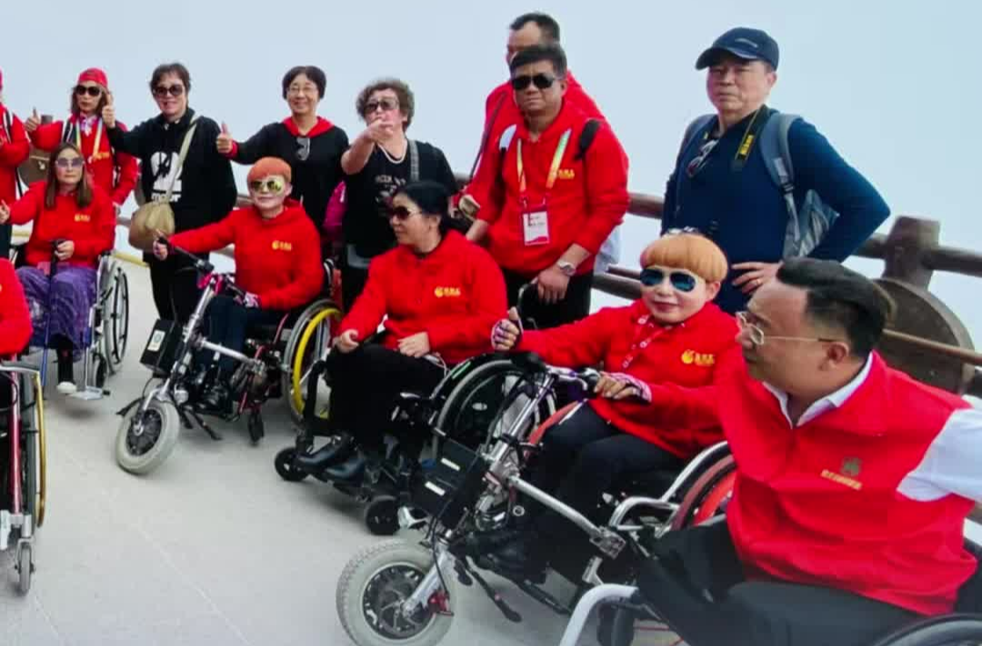 推动无障碍旅游发展，他想让更多残友领略祖国大好河山